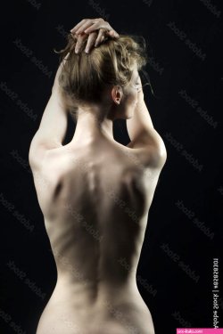 Thin naked female body Stock