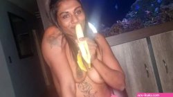 Topless desi squeezes her boobs as she sucks and deepthroats on a banana watch online
