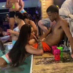 Woman gives him a blowjob in public