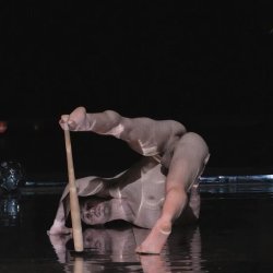Male nude on stage